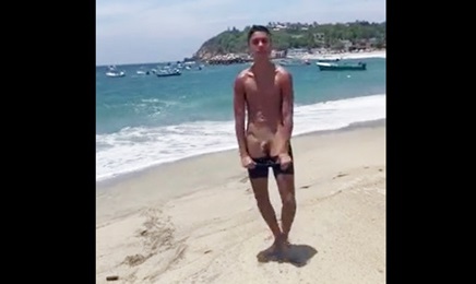Boy shows his penis for the friend at the beach